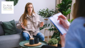 image of woman who is explaining something to a person with a clipboard